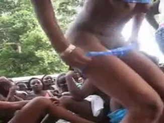 slim ebony jamaican chick bares it all on stage and the ppl go wild