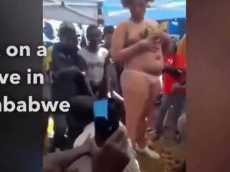 Zimbabwe woman fucks on top of grave